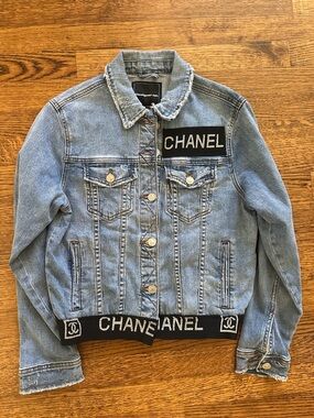 CHANEL Blue Denim Jacket with Black Logo Trim